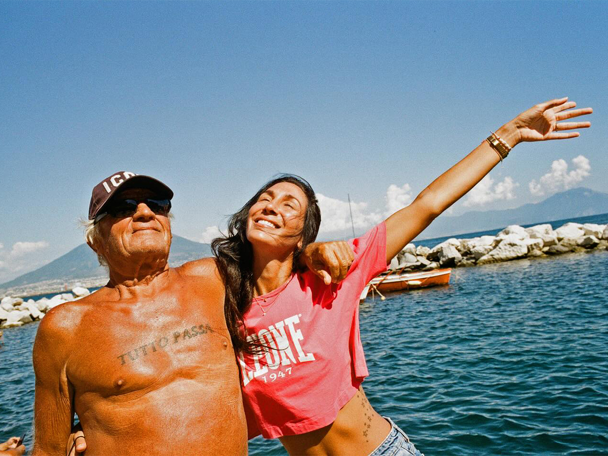 Man and woman on beach in Naples, iItaly