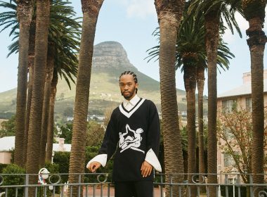 Thebe Magugu on the balcony of the Thebe Magugu Suite with Palm Avenue and Lion’s Head in the background